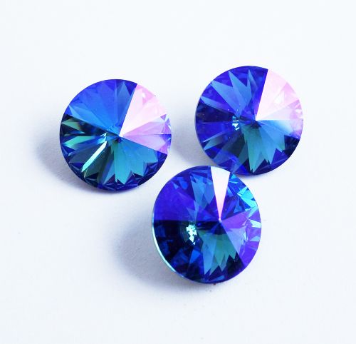 1122 Sapphire Glacier Blue Rivoli 14 mm Swarovski